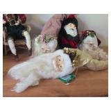 (4) Santa Head Ornaments, (1) Snowman Door Know Hanger, (1) Santa in a Chair Figure