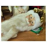 (4) Santa Head Ornaments, (1) Snowman Door Know Hanger, (1) Santa in a Chair Figure