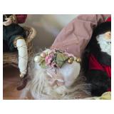 (4) Santa Head Ornaments, (1) Snowman Door Know Hanger, (1) Santa in a Chair Figure