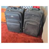 Lot of (2) Ricardo Rolling Suitcases