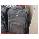 Lot of (2) Ricardo Rolling Suitcases