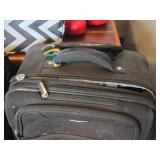 Lot of (2) Ricardo Rolling Suitcases