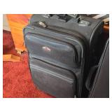 Lot of (2) Ricardo Rolling Suitcases