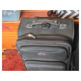 Lot of (2) Ricardo Rolling Suitcases