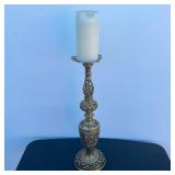 Ornate Brass Candle stick with candle