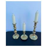 Set of 3 gold candlesticks