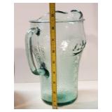 Various Kitchen items Pelican shaped wood Cutting Board, Coca cola drink pitcher, Cookie jar and more