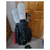 Golf Club Set, Wilson head covers, Feather Lite Irons, and 1 wood, golf bag and more