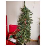 Various Christmas items, tree with lights, Teddy bear, runner and more