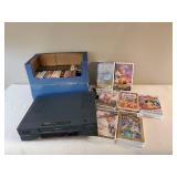 ProScan VCR and box of Various VHS tapes