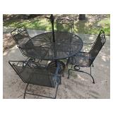 Lightly used Wrought patio set 4 chairs Table with umbrella and stand