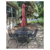 Lightly used Wrought patio set 4 chairs Table with umbrella and stand