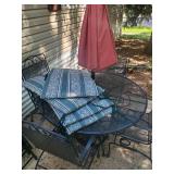 Lightly used Wrought patio set 4 chairs Table with umbrella and stand