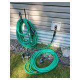 2 Garden Hoses with sprayers and 2 sprinklers