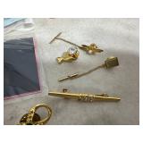 Assorted Jewelry, Collectible Pins, Figurines, and More