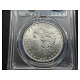 1897 Silver Morgan Dollar - PCGS MS65 CAC - PCGS Price Guide Value for an MS65 is $300