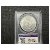 1897 Silver Morgan Dollar - PCGS MS65 CAC - PCGS Price Guide Value for an MS65 is $300