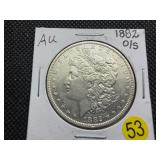 1882 O/S Silver Morgan Dollar Marked AU when Purchased - Greysheet Wholesale Value for an AU50 is $107