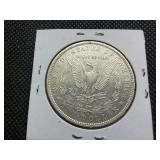 1882 O/S Silver Morgan Dollar Marked AU when Purchased - Greysheet Wholesale Value for an AU50 is $107