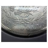 1882 O/S Silver Morgan Dollar Marked AU when Purchased - Greysheet Wholesale Value for an AU50 is $107