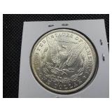 1884-O Silver Morgan Dollar Marked MS64 when Purchased - Greysheet Wholesale Value for an MS64 is $94