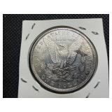 1887 Silver Morgan Dollar Marked AU when Purchased