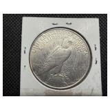 1922-D Silver Peace Dollar Marked AU when Purchased