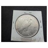 1922-D Silver Peace Dollar Marked AU when Purchased