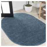 JONATHAN Y Haze Solid Low-Pile Turquoise 4 ft. x 6 ft. Oval Area Rug