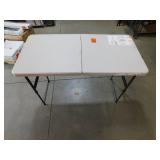 HDX 4 ft. Almond Resin Top Single Hand Adjustable Height Indoor/Outdoor Rectangular Folding Utility Table