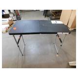 HDX 4 ft. Black Resin Top Single Hand Adjustable Height Indoor/Outdoor Rectangular Folding Utility Table