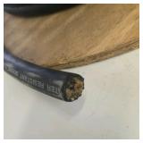 Spool of Black Heavy Gauge Electrical Cable Wire