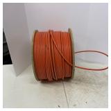 Spool of Orange Copper Electrical Wire