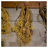 Lot of Extension Cords and Yellow Cage Work Lights