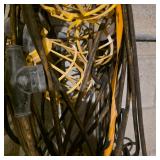 Lot of Extension Cords and Yellow Cage Work Lights