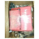 This box contains a variety of mixed garage and shop tools, including a red plastic case and a staple gun.