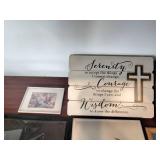This collection of wall art features a rustic wood-framed sign with the Serenity Prayer as its central piece.