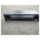 This is an LACK TV unit in black with a minimalist, open-shelf design