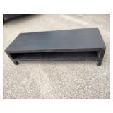 This is an LACK TV unit in black with a minimalist, open-shelf design