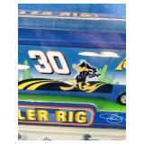 Two Winner’s Circle NASCAR Trailer Rigs