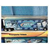 Hot Wheels Racing Richard Petty Transporter Tribute die-cast trucks.