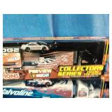 Racing Champions NASCAR Collectors Series transporter and die-cast stock car sets.