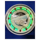 Neonetics 1957 Chevrolet neon clock with a chrome finish and hand-blown glass neon ring.