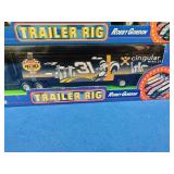 2  Robby Gordon #31 Cingular Wireless NASCAR trailer rigs from the 2002 Winner