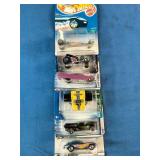 This collection contains a variety of vintage and specialized Mattel Hot Wheels carded die-cast cars spanning from the late 1990s through the mid-2000s.