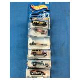 Six classic Mattel Hot Wheels carded die-cast cars.