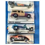 Six classic Mattel Hot Wheels carded die-cast cars.