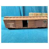 Athearn HO Scale freight cars, featuring a Southern Pacific boxcar and an automobile boxcar