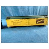 HO Scale models of a Chicago and North Western Railway F7 diesel locomotive and matching box car.