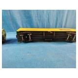 HO Scale models of a Chicago and North Western Railway F7 diesel locomotive and matching box car.